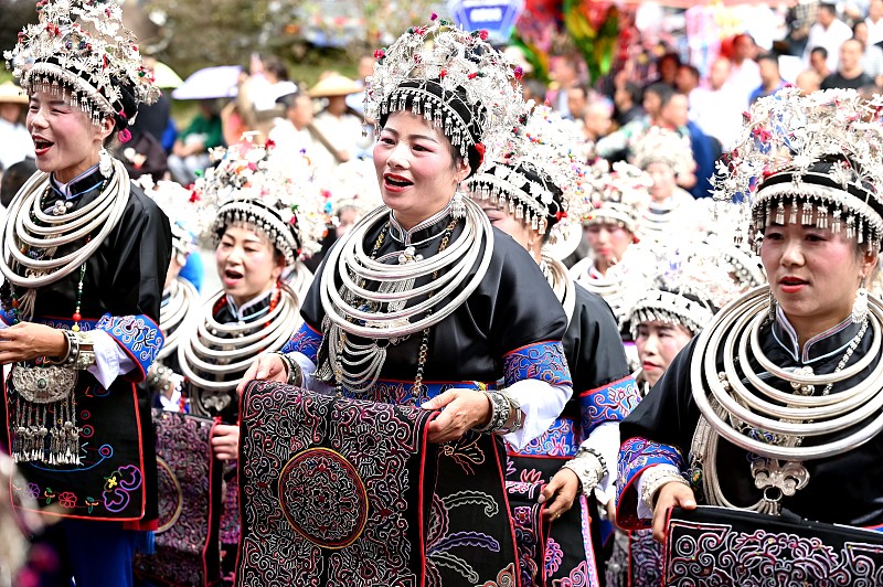 Women from the Dong ethnic group display their embroidery work during a folk festival in Jinping County, Guizhou Province, October 25, 2023. /CFP