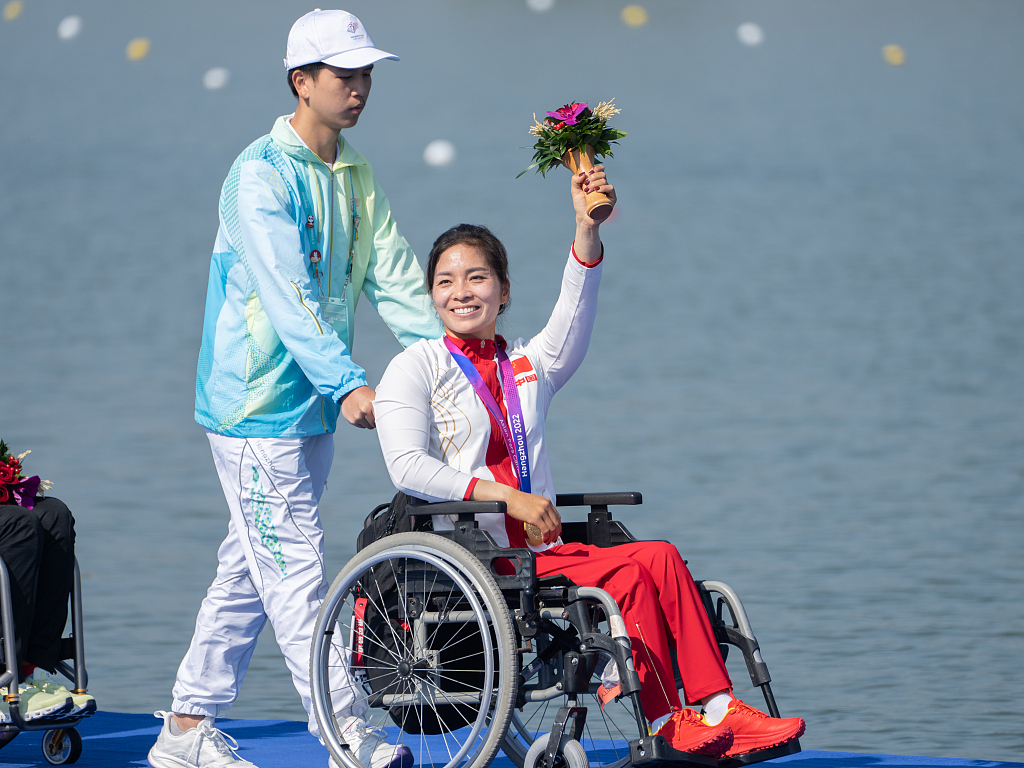 China's Xie Maosan acknowledges the crowd after winning the women's KL1 canoeing at the 4th Asian Para Games in Hangzhou, Zhejiang Province, China, October 23, 2023. /CFP