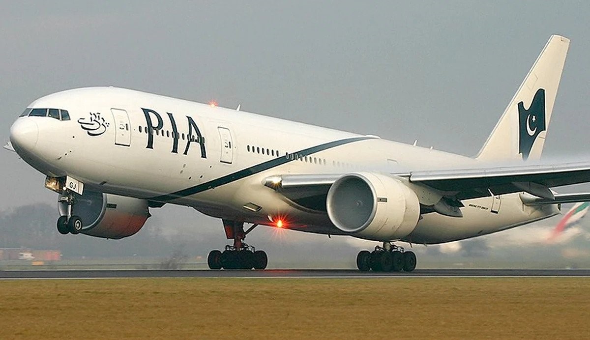 FILE: A Pakistan International Airlines Boeing 777 aircraft lands at Islamabad International airport. /Reuters