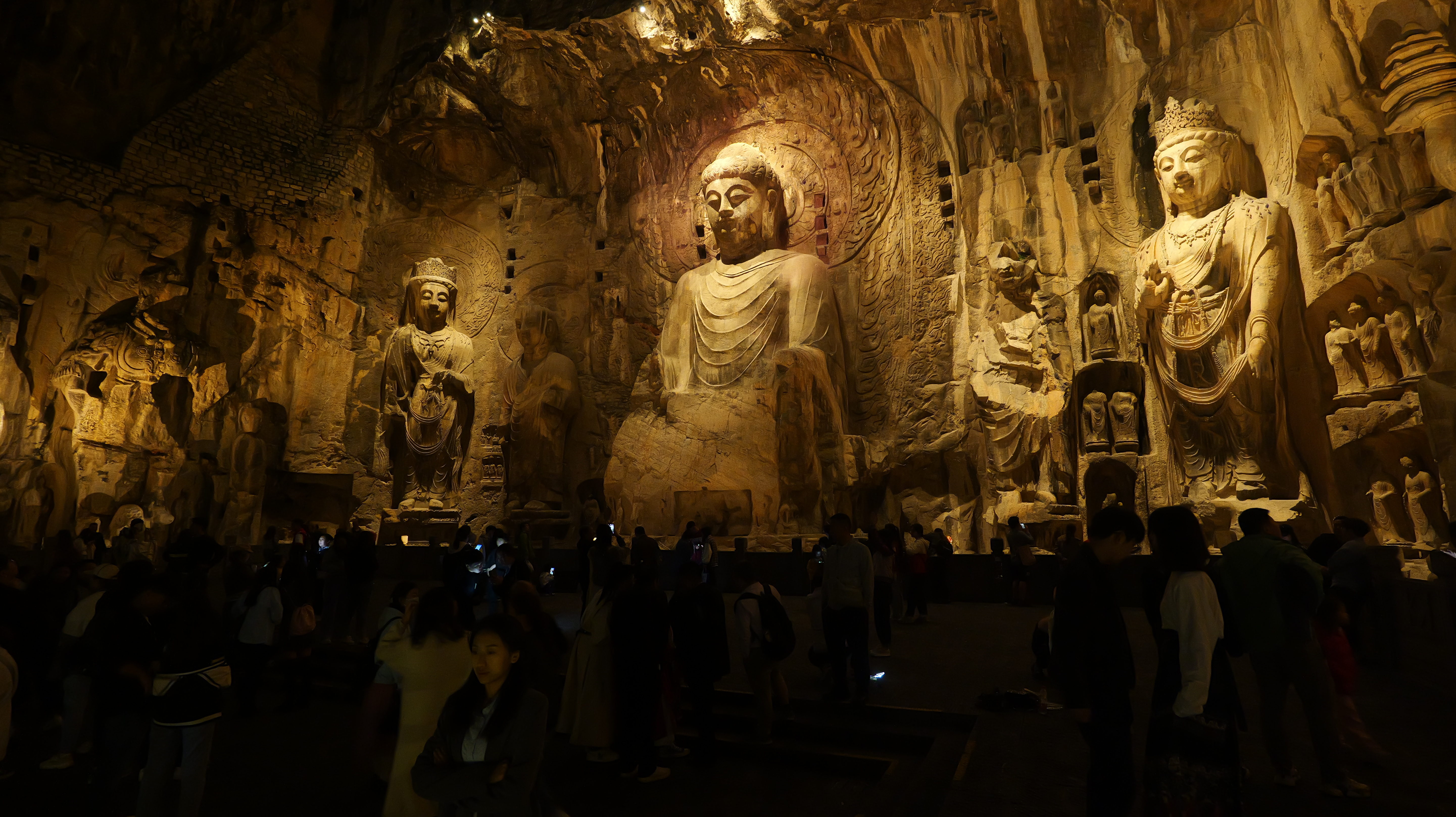 The illumination at night offers the Buddha statues an aura of mystery and grandeur. /IC  
