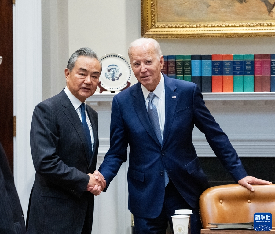 Wang Yi (L), a member of the Political Bureau of the Communist Party of China Central Committee and Chinese Foreign Minister, shakes hands with U.S. President Joe Biden in Washington, D.C., the U.S., October 27, 2023. /Xinhua