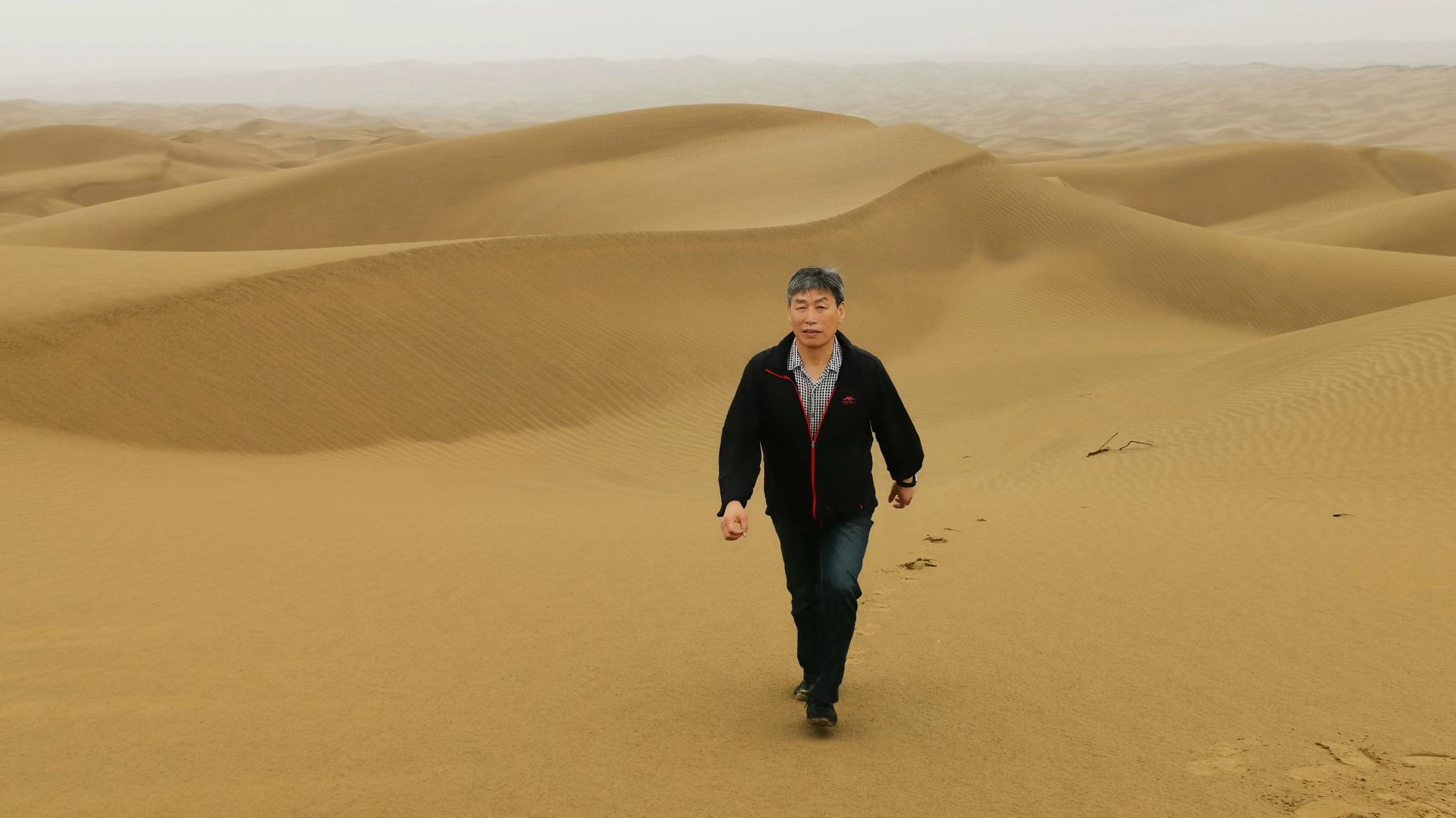 Lei Jiaqiang in the Taklimakan Desert, northwest China's Xinjiang Uygur Autonomous Region, August 19, 2019. /Courtesy of Lei Jiaqiang