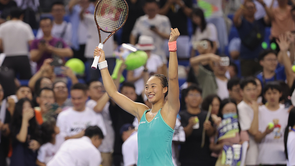 Zheng Qinwen celebrates after defeating Jelena Ostapenko at WTA Elite Trophy in Zhuhai, south China's Guangdong Province, October 27, 2023. /CFP