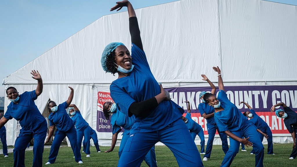 Health workers attend a dance session at Kenyatta stadium in Machakos, Kenya, as a part of the celebration of 2020, the International Year of the Nurse and the Midwife, June 19, 2020. /CFP