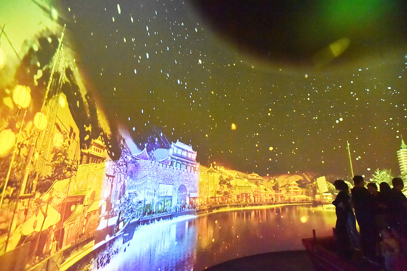 Visitors enjoy a Grand Canal-themed multimedia exhibition at the Yangzhou China Grand Canal Museum in Jiangsu Province, October 27, 2023. /CFP