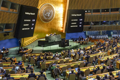 Voting results are displayed as the Unite Nations General Assembly voted on a nonbinding resolution calling for a 