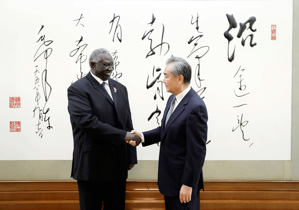 Wang Yi (R), a member of the Political Bureau of the CPC Central Committee and director of the Office of the Foreign Affairs Commission of the CPC Central Committee, meets Malik Agar, deputy chairman of Sudan's Transitional Sovereign Council, in Beijing, China, November 2, 2023. /Chinese Foreign Ministry