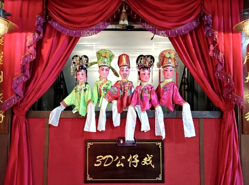 These puppets are used to perform Hainan Doll Opera. /Photo provided to CGTN