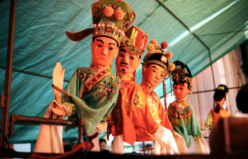 These puppets are used to perform Hainan Doll Opera. /Photo provided to CGTN