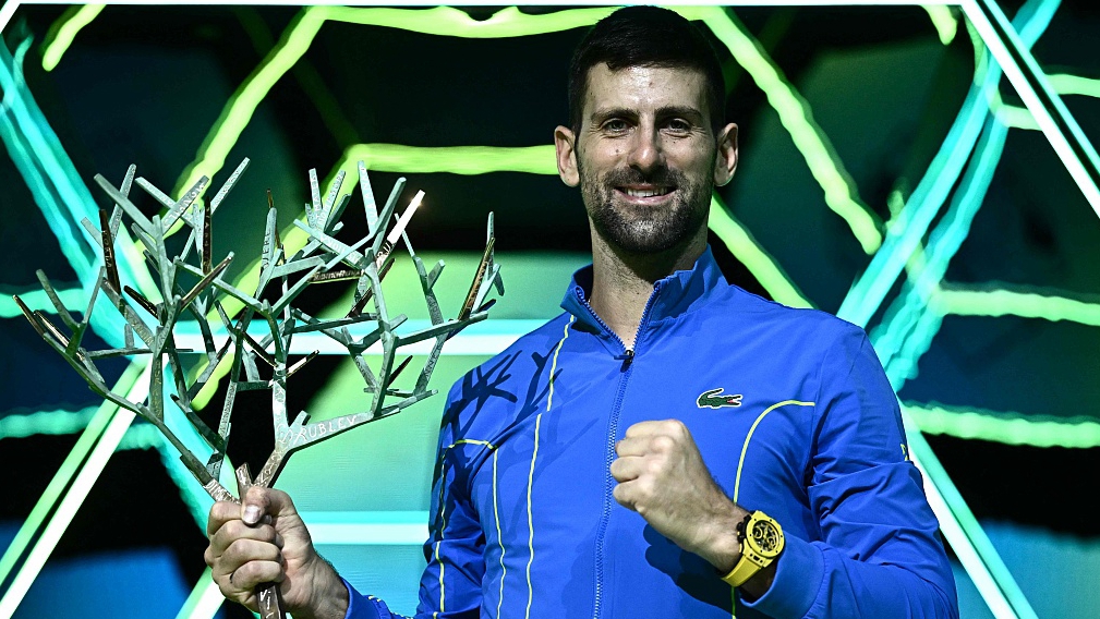 Novak Djokovic poses with a trophy after winning the men's singles final match at the Paris Masters in Paris, France, November 5, 2023. /CFP