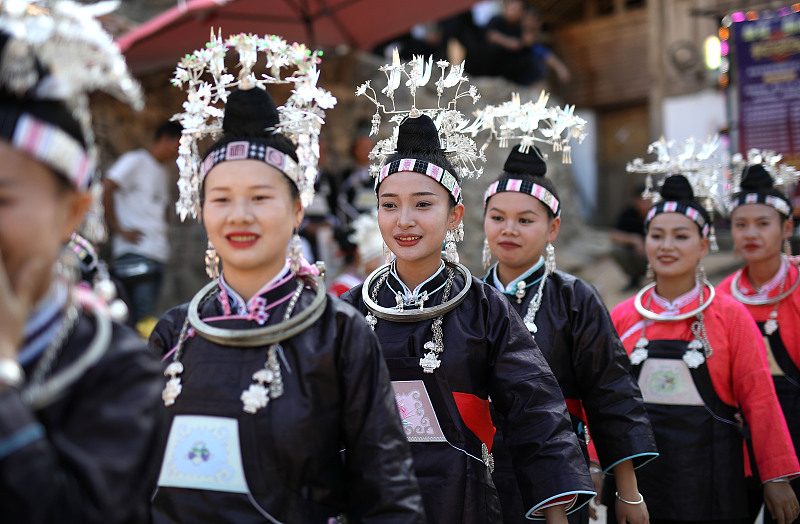 Miao women dressed in traditional costumes take part in a parade in Danzhai County, Qiandongnan Miao and Dong Autonomous Prefecture, Guizhou Province, November 6, 2023. /CFP