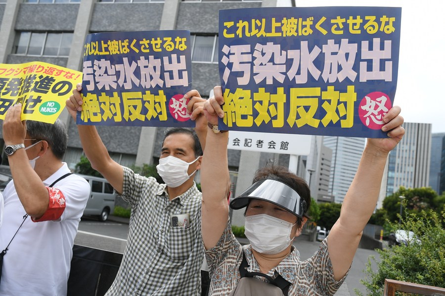 People gather to protest the Japanese government's irresponsible decision to start releasing nuclear-contaminated wastewater in front of the Japanese prime minister's official residence in Tokyo, Japan, August 22, 2023. /Xinhua