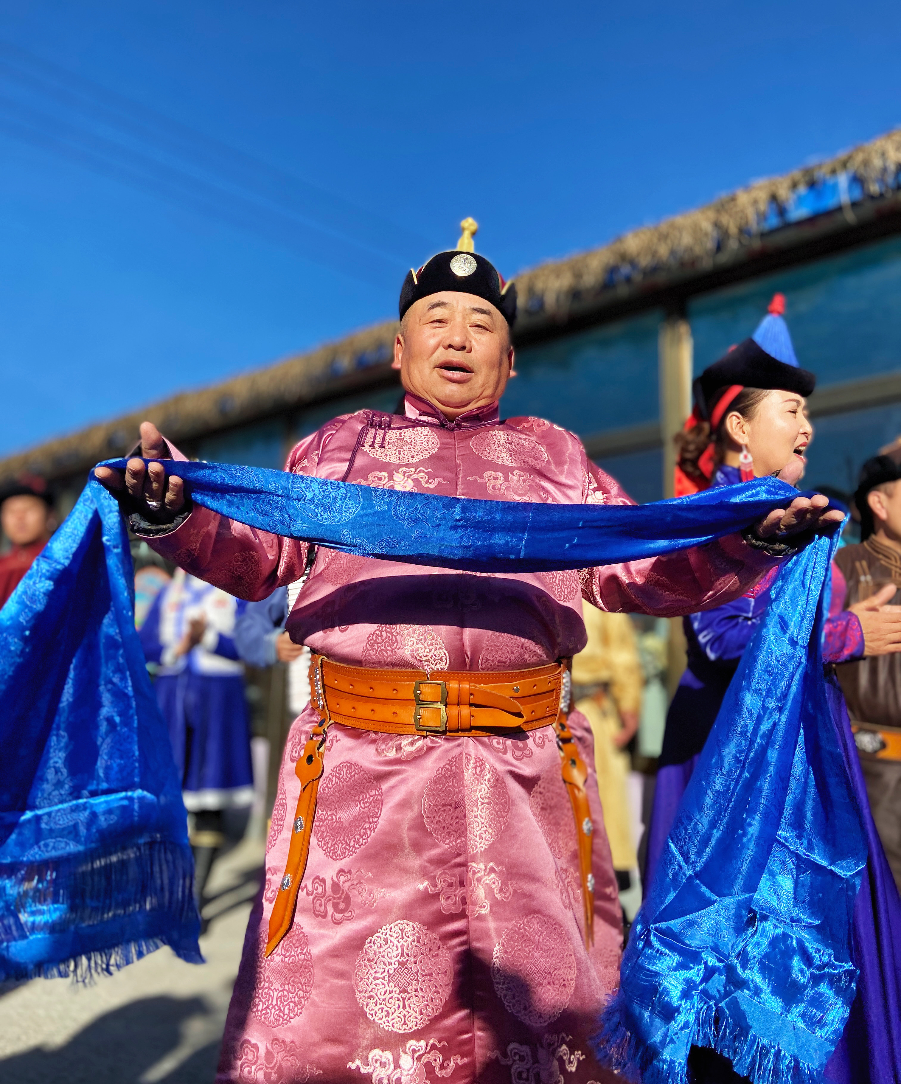 Locals perform in traditional attire to showcase the cultures present in Bogdal Village, Xinjiang. /CGTN