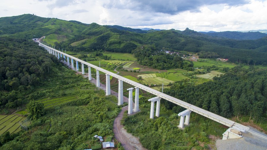 Aerial view of the China-Laos railway over the villages and fields in northern Laos, July 29, 2020. /Xinhua