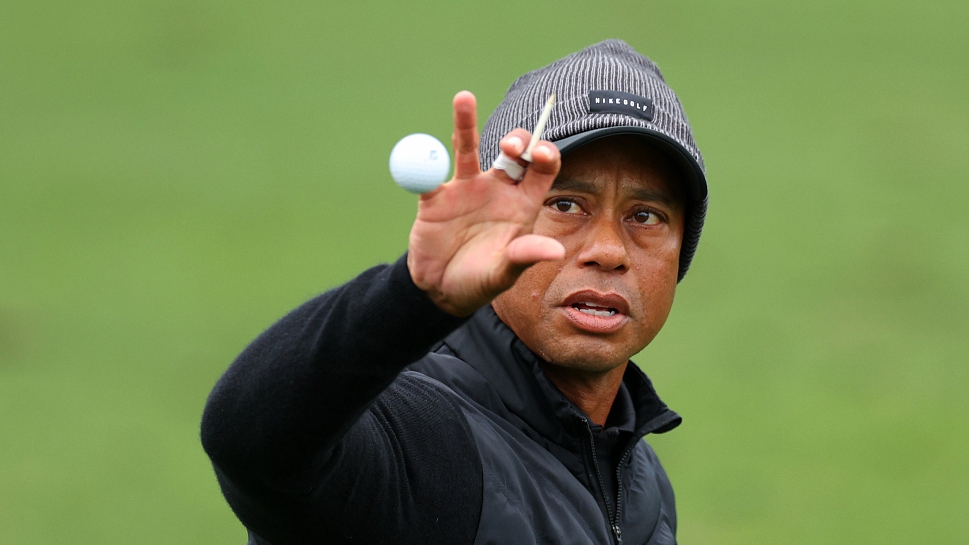 Tiger Woods catches a ball on the practice area during the third round of the 2023 Masters tournament at Augusta National Golf Club in Augusta, Georgia, April 8, 2023. /CFP