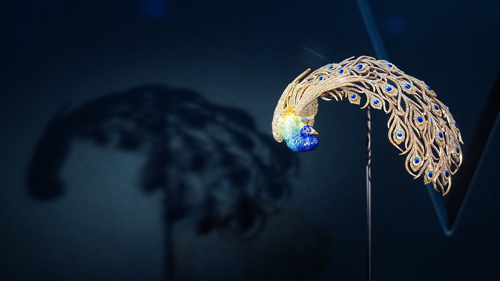 A photo taken on November 8, 2023, shows a peacock feather ornament displayed at the China International Import Expo in Shanghai, China. /CFP