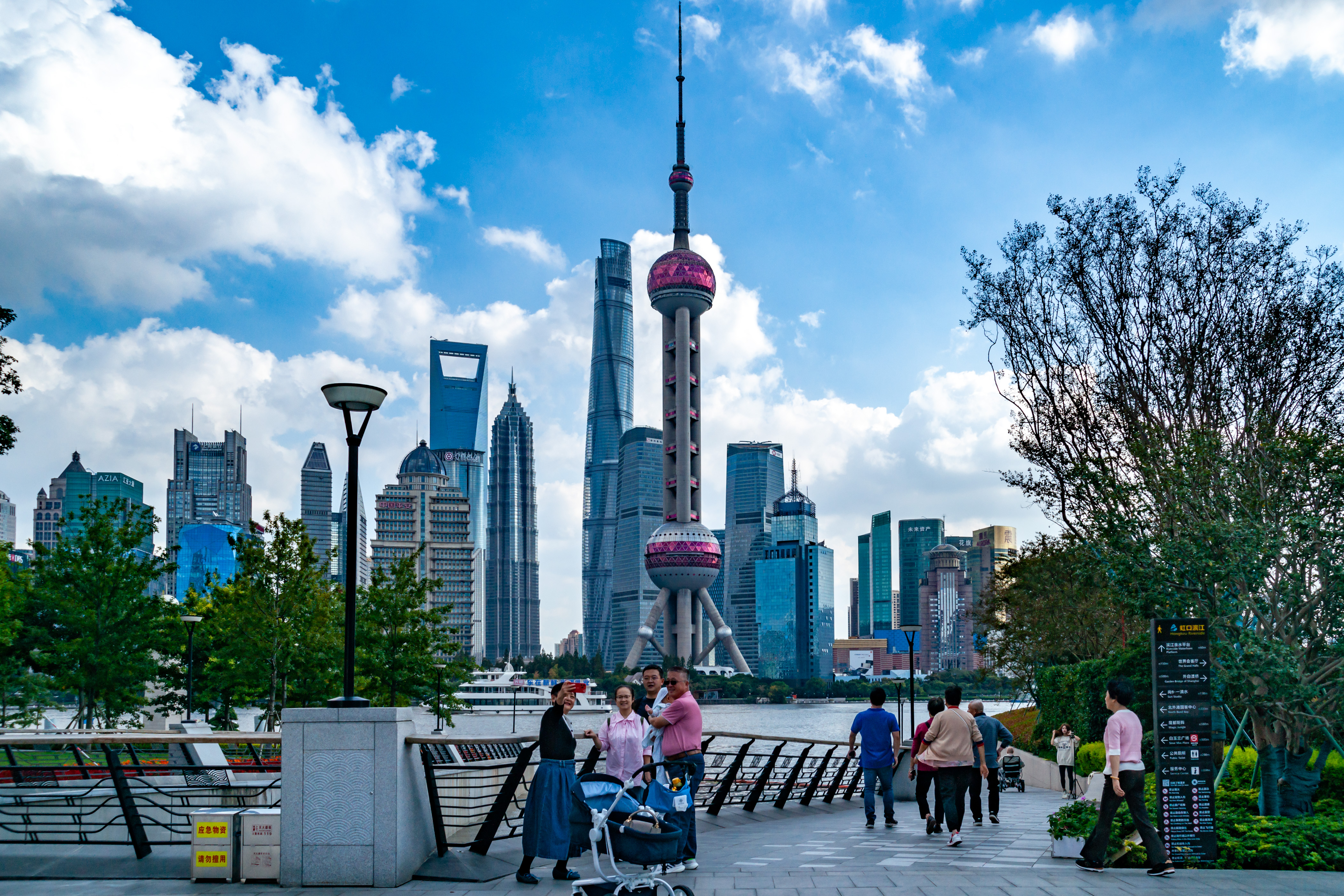 People enjoy a stroll down the Bund in Shanghai, October 30, 2023. /IC
