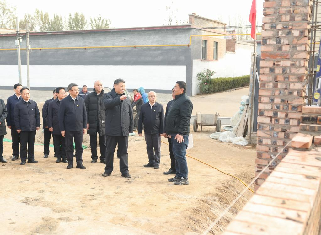 Chinese President Xi Jinping, also general secretary of the Communist Party of China Central Committee and chairman of the Central Military Commission, inspects a construction site for house rebuilding in Wanquanzhuang Village in the city of Zhuozhou, north China's Hebei Province, November 10, 2023. /Xinhua