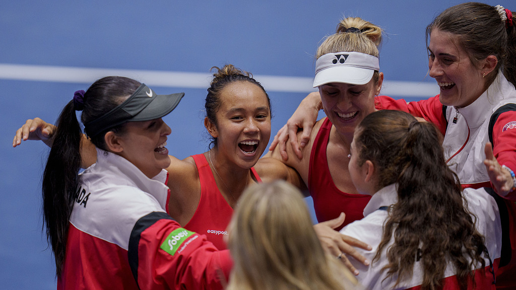 Team Canada celebrate after advancing to the Billie Jean King Cup final in Seville, Spain, November 11, 2023. /CFP