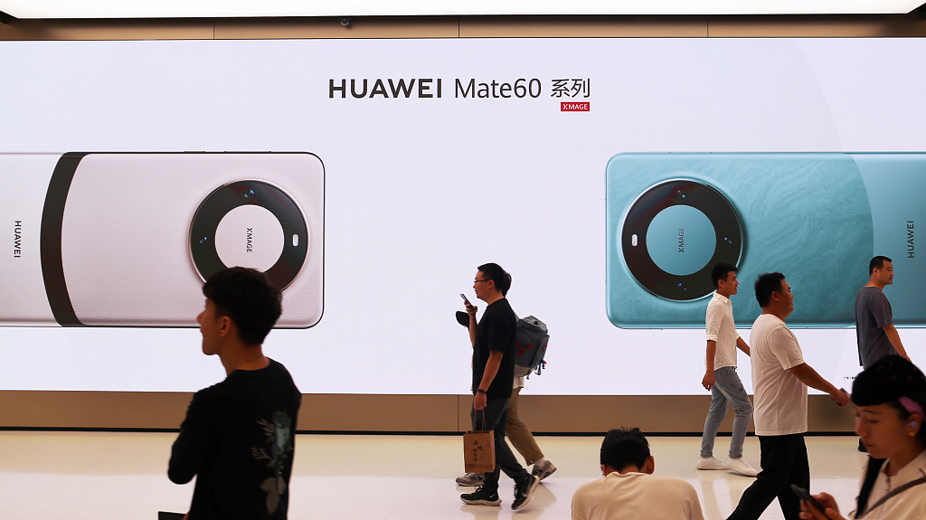An ad for the new smartphone Mate 60 Pro shows on a big screen in Huawei flagship store in Shanghai, September 24, 2023. /CFP