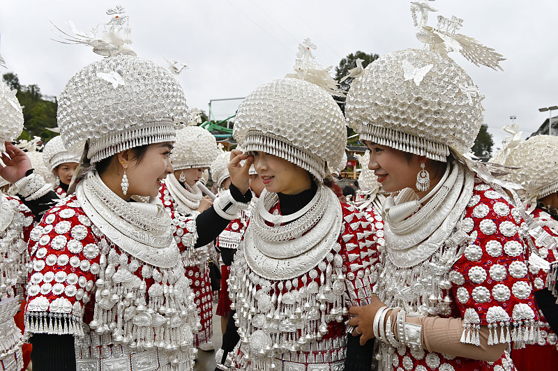 Miao women dressed in traditional costumes adorned with silver celebrate the Lusheng Festival in Gulong Town, Huangping County, Qiandongnan Miao and Dong Autonomous Prefecture, Guizhou Province, on November 10, 2023. /CFP