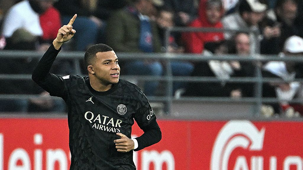 Kylian Mbappe celebrates after scoring his first goal in a Ligue 1 match against Reims in Reims, France, November 11, 2023. /CFP