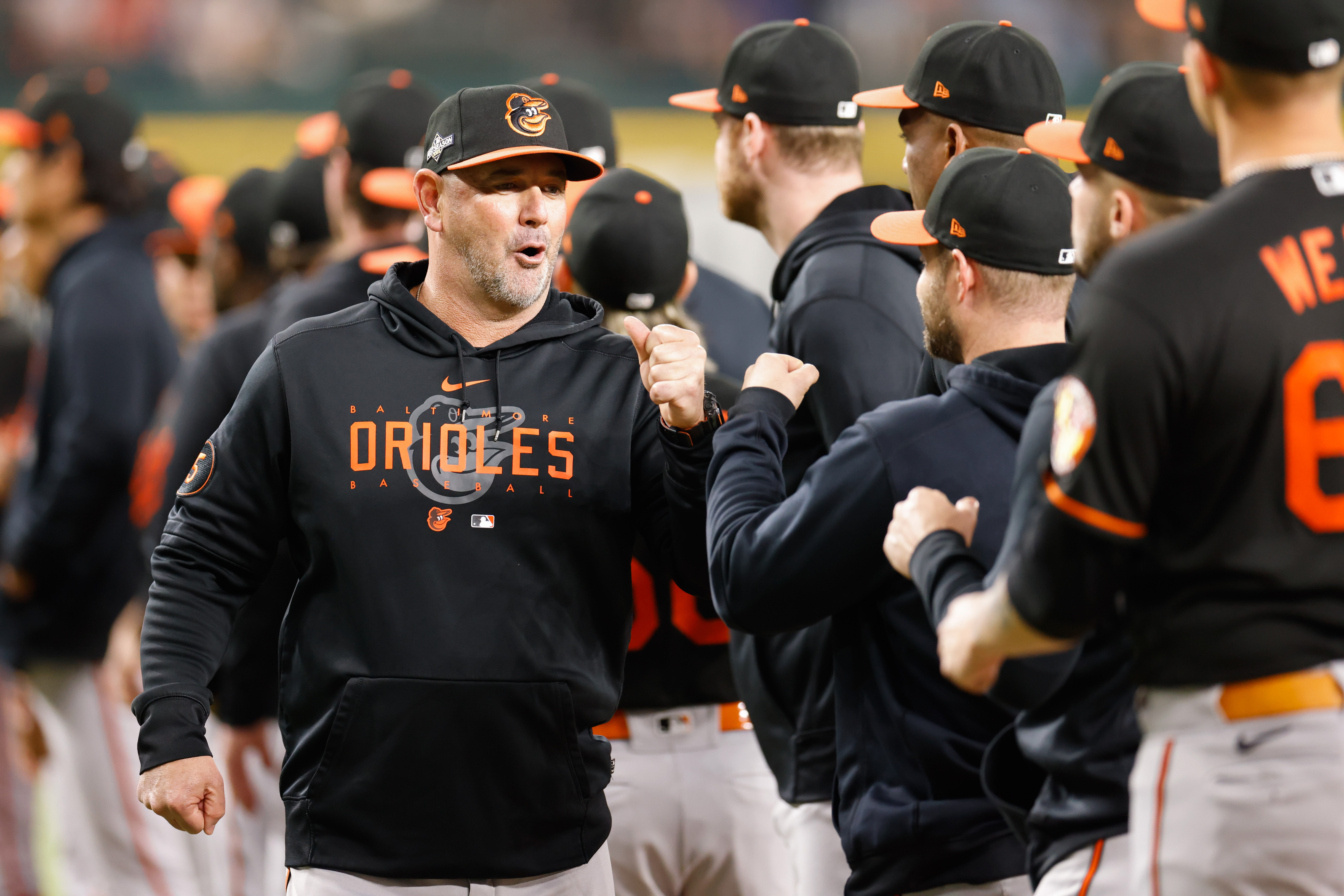 Brandon Hyde, manager of the Baltimore Orioles, greets his players ahead of Game 3 of the American League Division Series against the Texas Rangers at Globe Life Field in Arlington, Texas, October 10, 2023. /CFP 