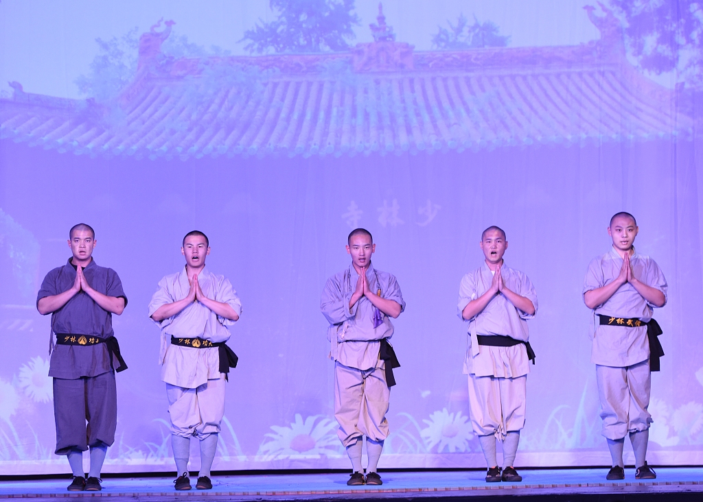Photo shows a group of Shaolin disciples practices kung fu at Million Dollar Theater in Los Angeles, United States on November 12, 2023. /CFP