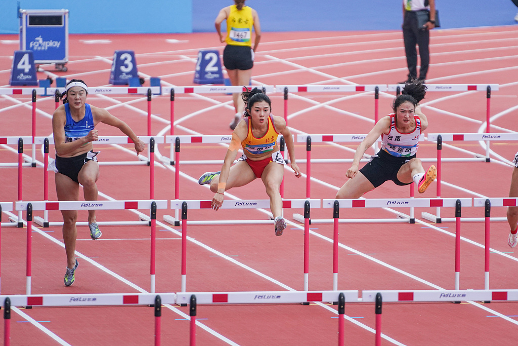 Athletes during the women's 100 meters hurdles event of the 1st Student (Youth) Games of China in Nanning, China's Guangxi Zhuang Autonomous Region, November 10, 2023. /CFP