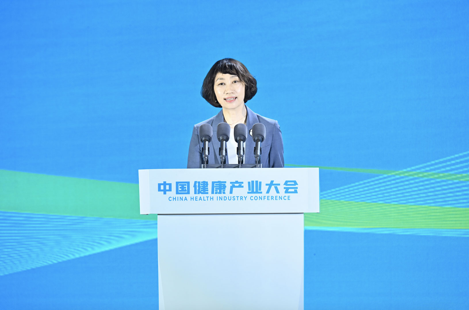 Xing Bo, vice president of China Media Group, gives a speech at the launching ceremony of the first China Health Industry Conference in Haikou City, south China's Hainan Province, November 17, 2023. /CMG