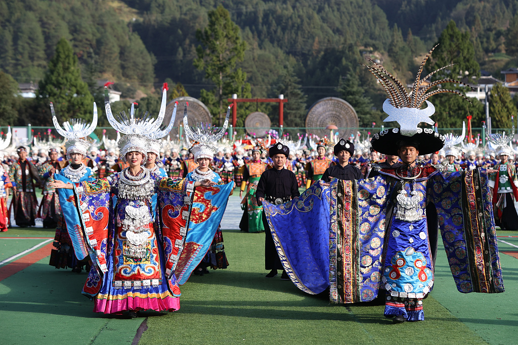 People of the Miao ethnic group showcase their traditional colorful costumes during celebrations of Miao New Year and Guzang Festival in Leishan County of Qiandongnan Miao and Dong Autonomous Prefecture, southwest China's Guizhou Province, on Nov. 16, 2023. /CFP