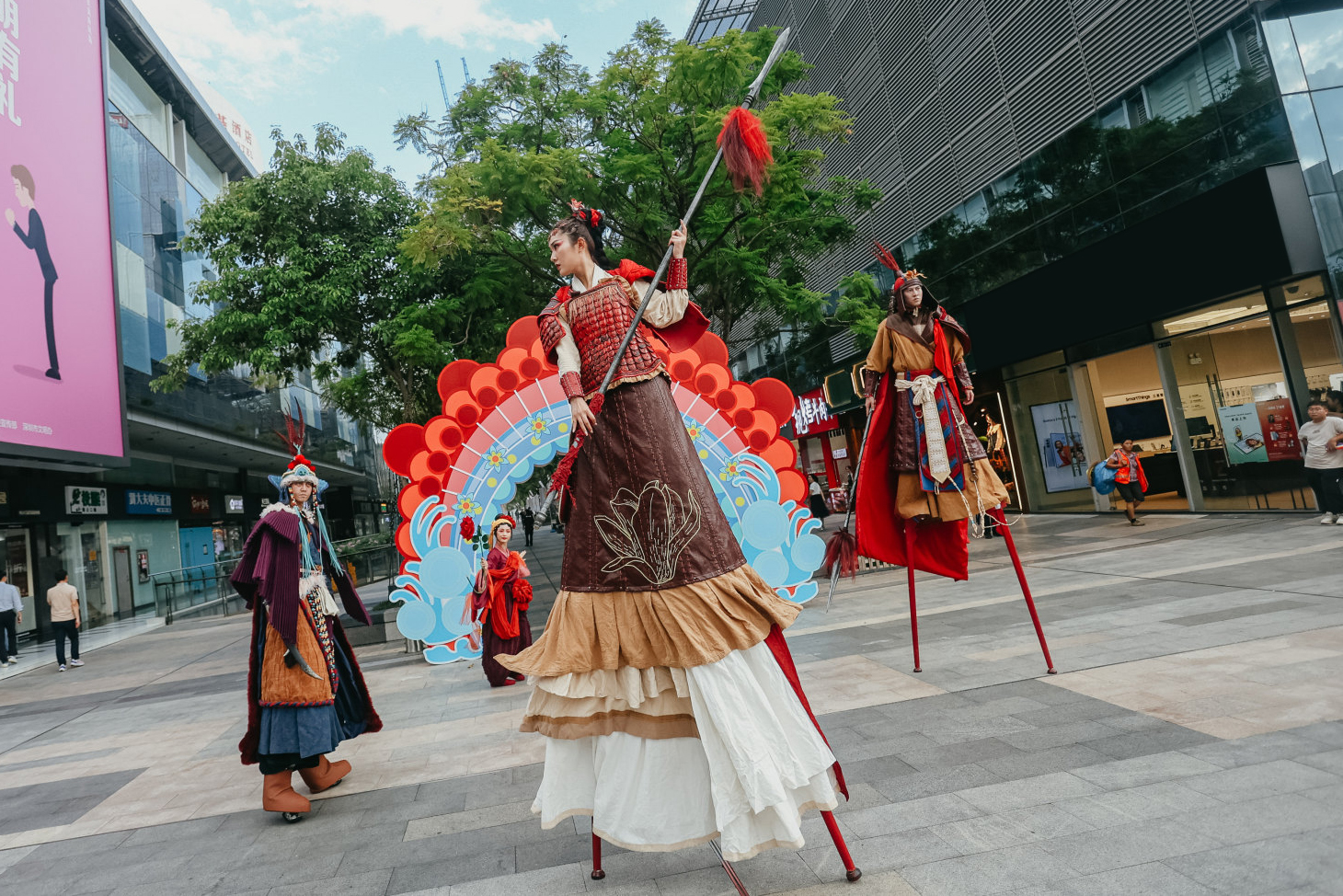 Performers are spotted on the street in Shenzhen during the 2023 Nanshan Theatre Festival. /Photo provided to CGTN