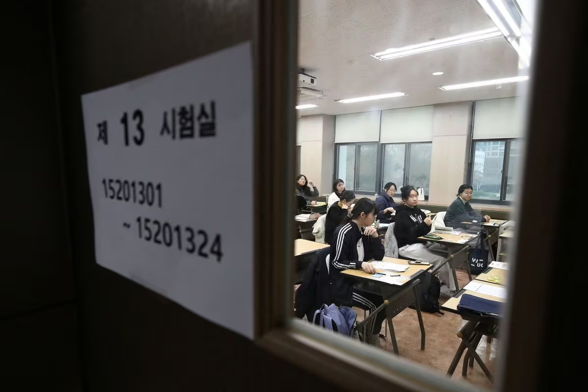 South Korean students wait to take the annual College Scholastic Ability Test at a school in Seoul, South Korea, on November 16, 2023. /Reuters