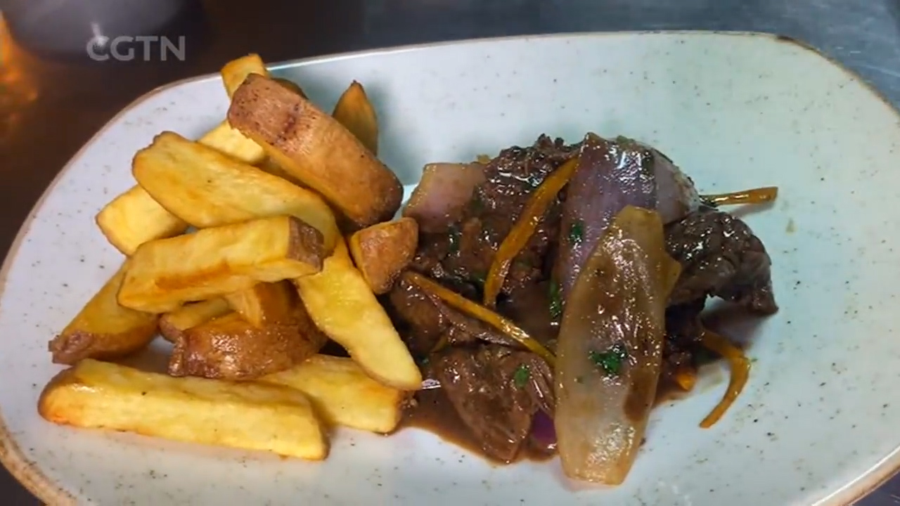 The lomo saltado can be served in different ways: with white rice and fries on the side or even noodles. /CGTN