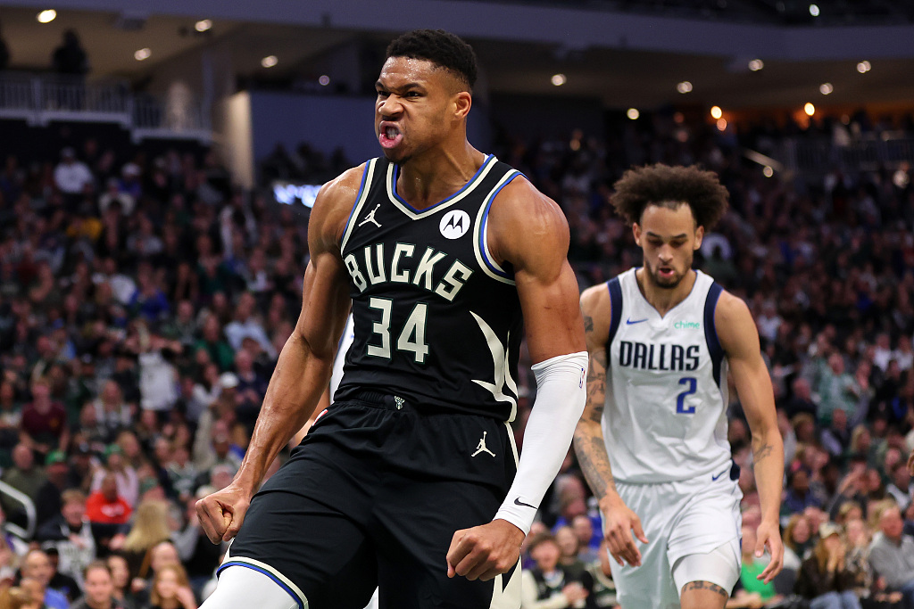 Giannis Antetokounmpo (#34) of the Milwaukee Bucks reacts after making a shot in the game against the Dallas Mavericks at Fiserv Forum in Milwaukee, Wisconsin, November 18, 2023. /CFP