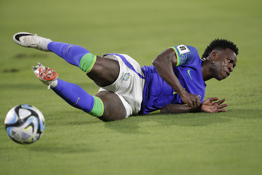 Vinicius Jr. falls down in the 2026 FIFA World Cup South American qualifier game against Colombia at Roberto Melendez Metropolitan Stadium in Barranquilla, Colombia, November 16, 2023. /CFP