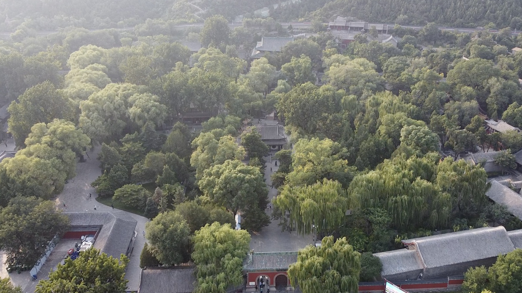 Jinci Temple surrounded by numerous ancient trees. /CMG