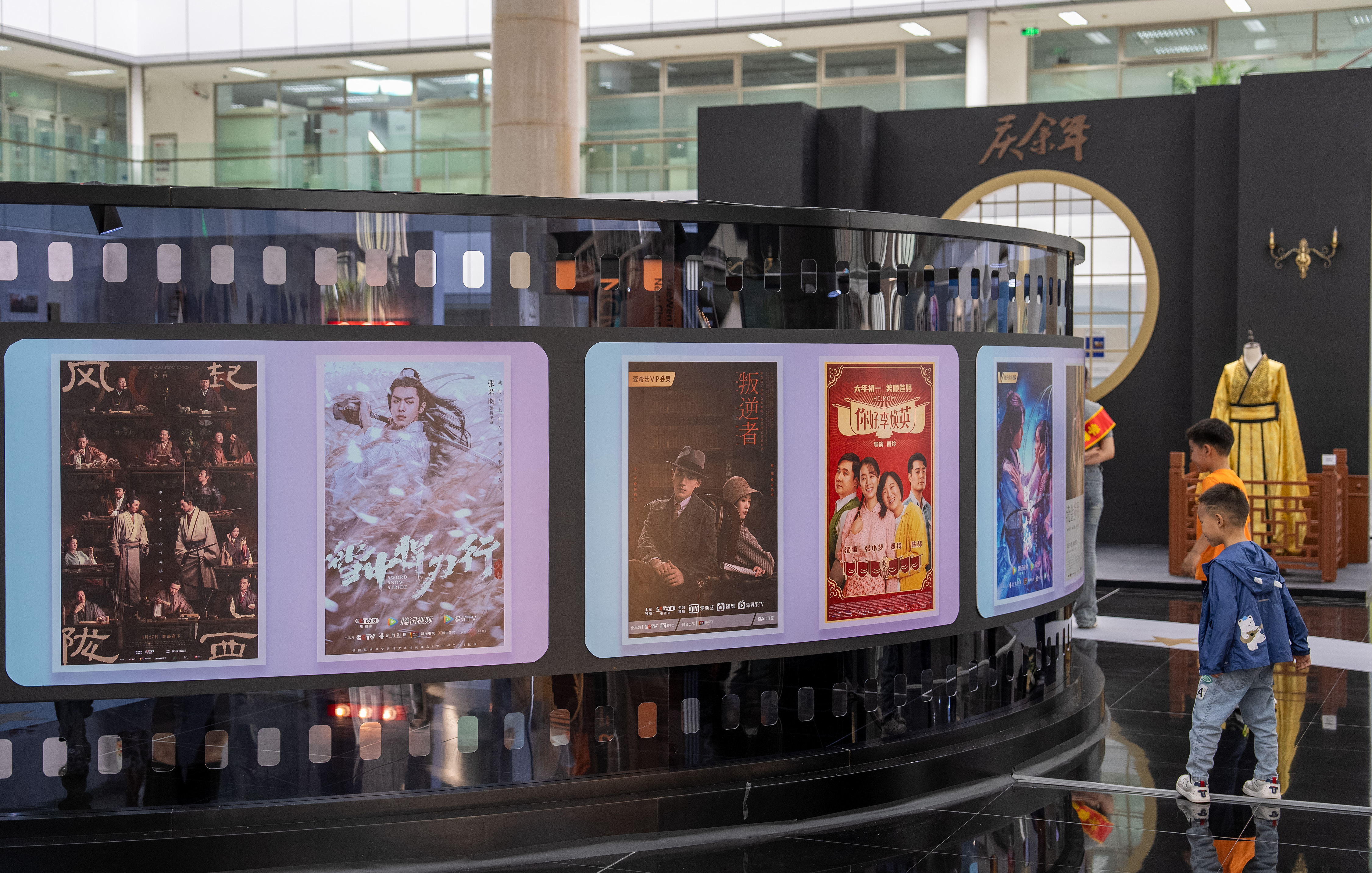 An exhibition of scenes from web novels which have been adapted into films and TV productions in a library in Dongguan, south China's Guangdong Province, April 22, 2023. /CFP
