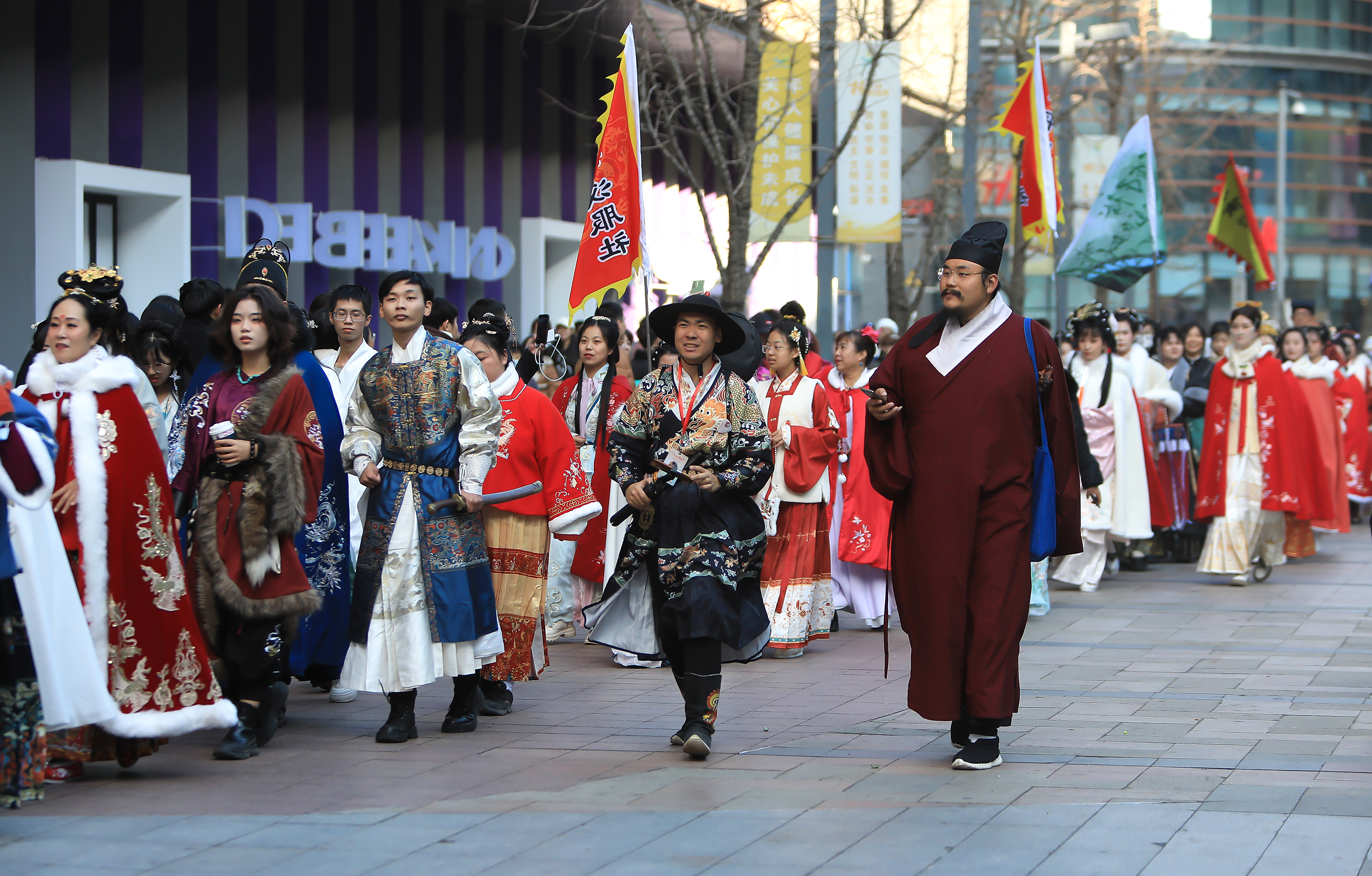 Hanfu enthusiasts take part in a parade in the Shenyang, Liaoning Province, during an annual hanfu-themed festival on November 18, 2023. /IC