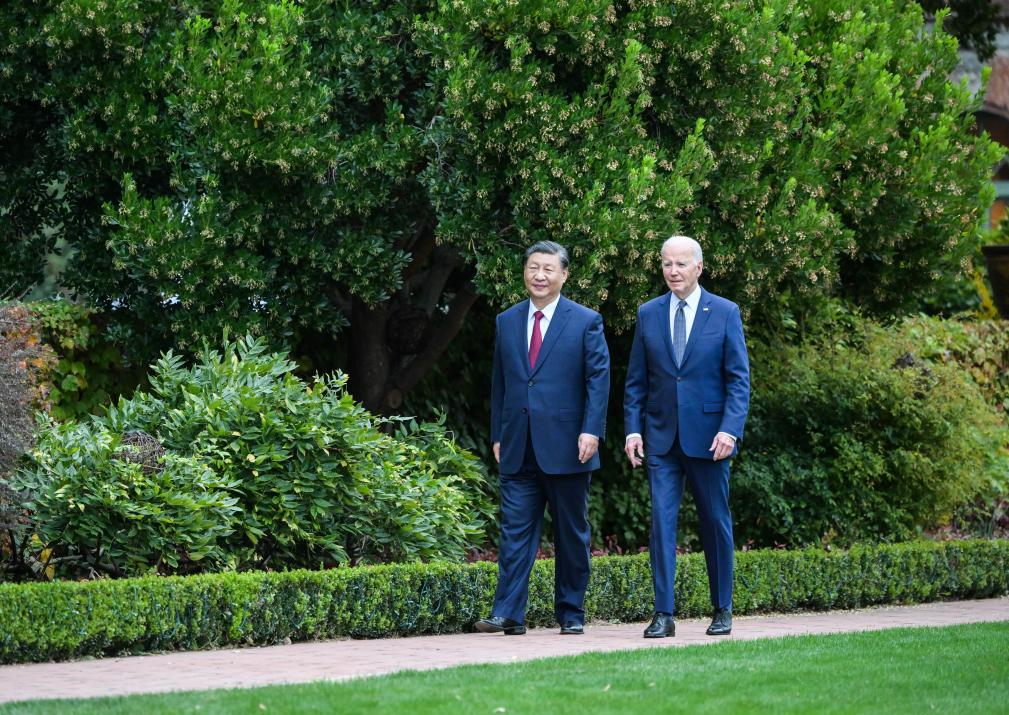 Chinese President Xi Jinping and U.S. President Joe Biden take a walk after their talks in the Filoli Estate, California, United States, November 15, 2023. /Xinhua