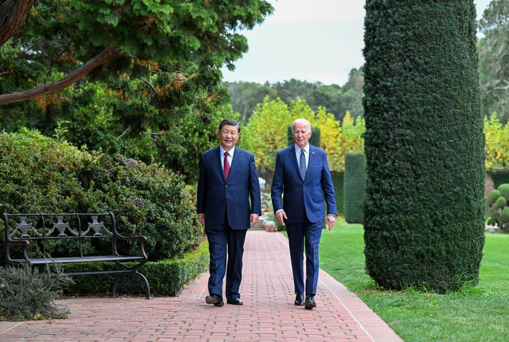 Chinese President Xi Jinping and U.S. President Joe Biden take a walk after their talks in the Filoli Estate, California, United States, November 15, 2023./Xinhua