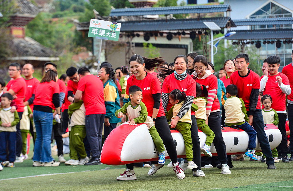 A sports event is held at an elementary school in Congjiang County, Guizhou Province, to mark World Children's Day, November 18, 2023. /CFP