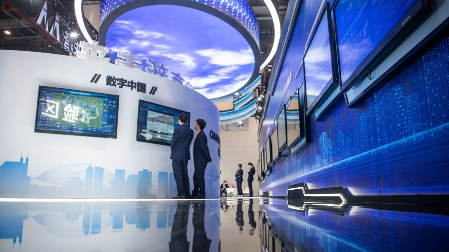 People visit an innovation achievements exhibition during the 2023 China 5G+ Industrial Internet Conference in Wuhan, central China's Hubei Province, November 20, 2023. /Xinhua