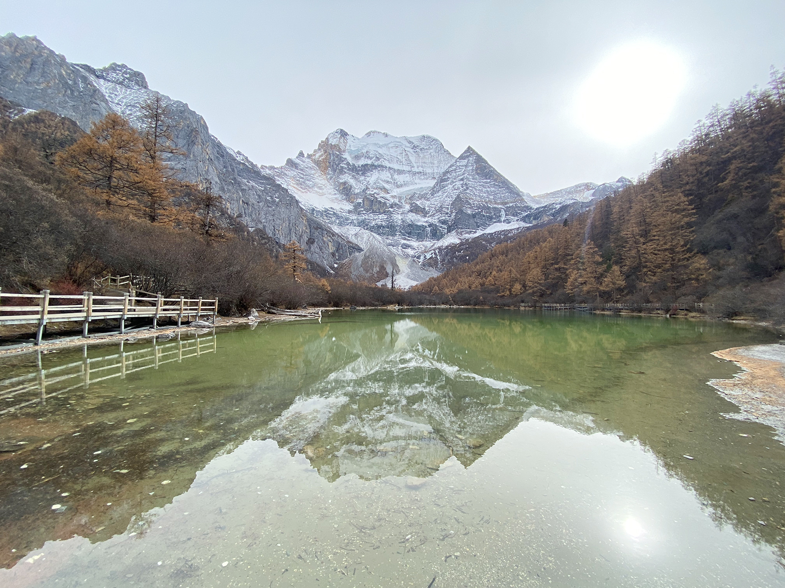 At 6,032 meters, Xiannairi is the highest peak of the three sacred snow-capped mountains at Daocheng Yading Nature Reserve, where its inverted reflection is seen in the waters of Zhuoma La Lake in Ganzi, Sichuan. /CGTN