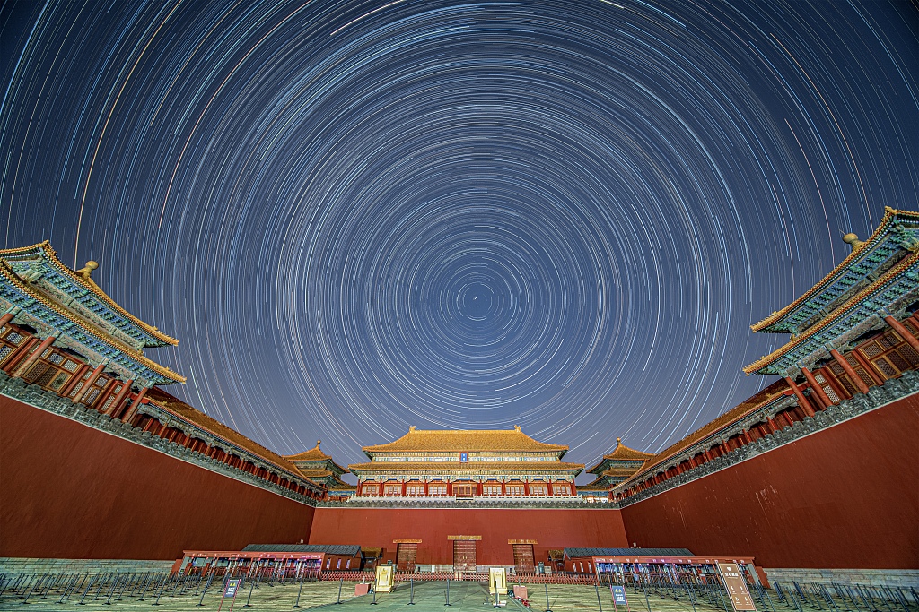 Star trails are seen in the skies over the Meridian Gate, the southernmost entrance and principal gateway to the Palace Museum in Beijing on November 17, 2023. /CFP