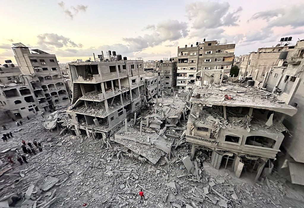 A view of collapsed, heavily damaged buildings after an Israeli airstrike on Beit Lahia town of Gaza, November 21, 2023. /CFP