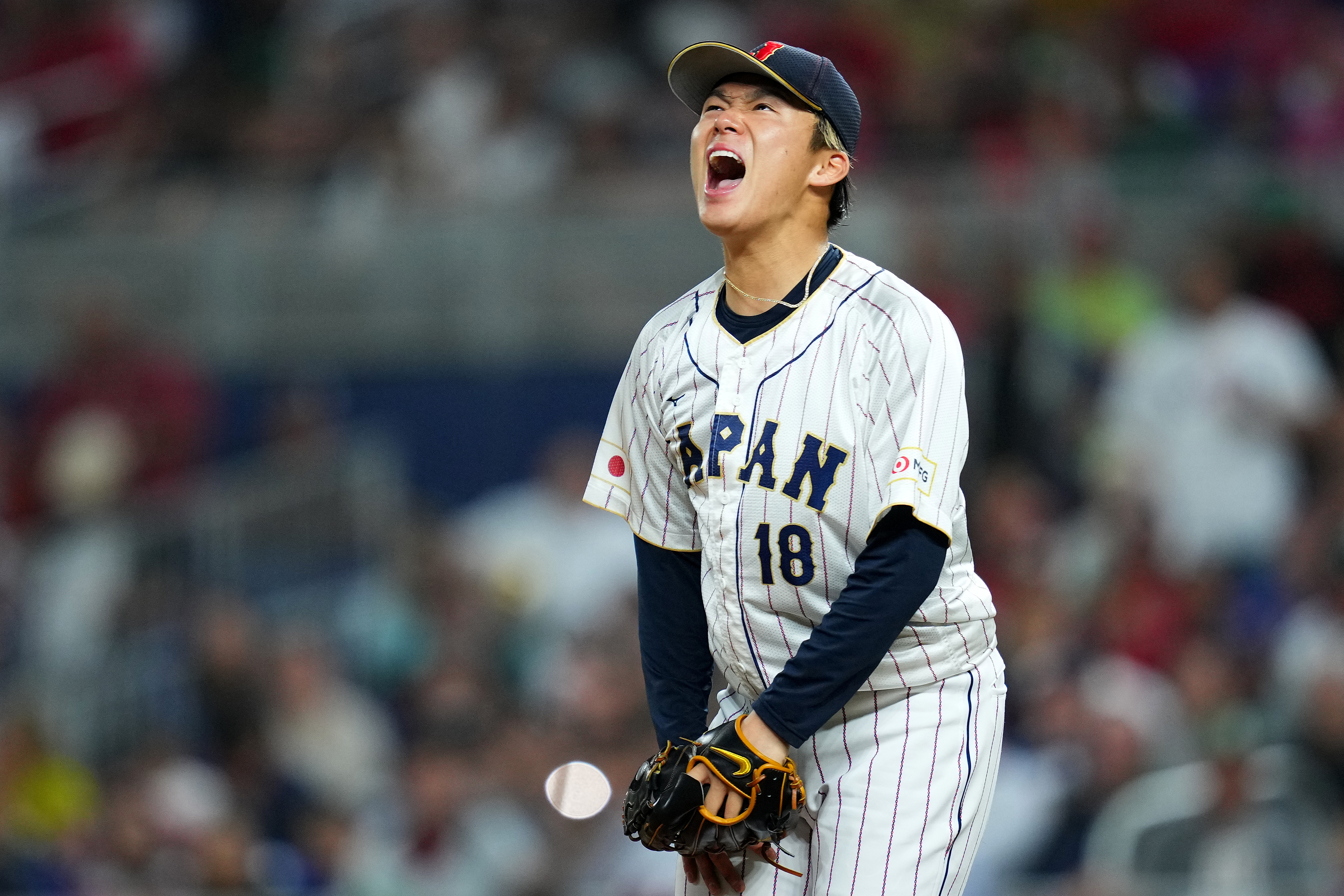 Yoshinobu Yamamoto of Japan reacts in the semfinals at the World Baseball Classic against Mexico at LoanDepot Park in Miami, Florida, March 20, 2023. /CFP 