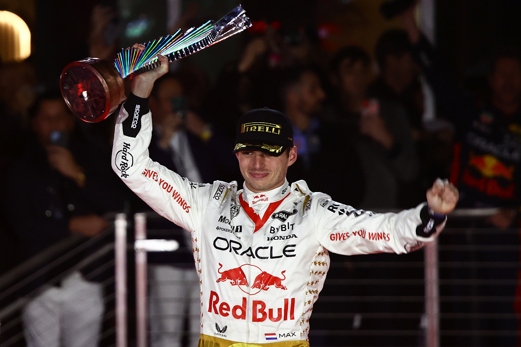 Max Verstappen of Red Bull Racing celebrates on the podium after winning the F1 Grand Prix in Las Vegas, U.S., November 18, 2023. /CFP