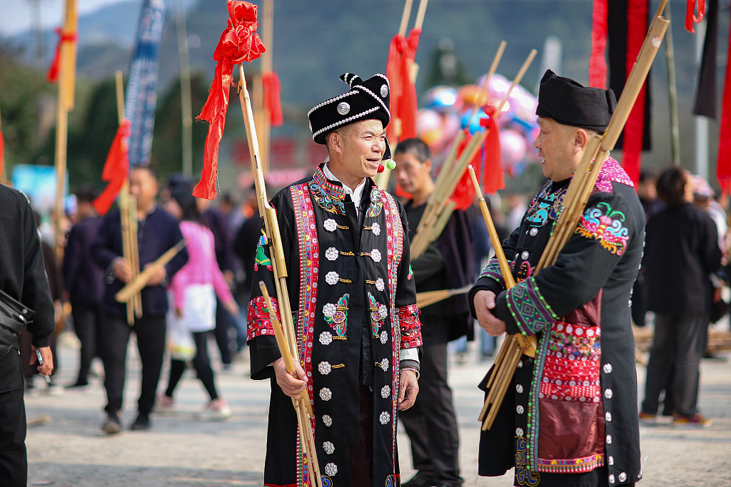 Lusheng players attend the Guzang Festival in Leishan County, southwest China's Guizhou Province on November 22, 2023. /CFP