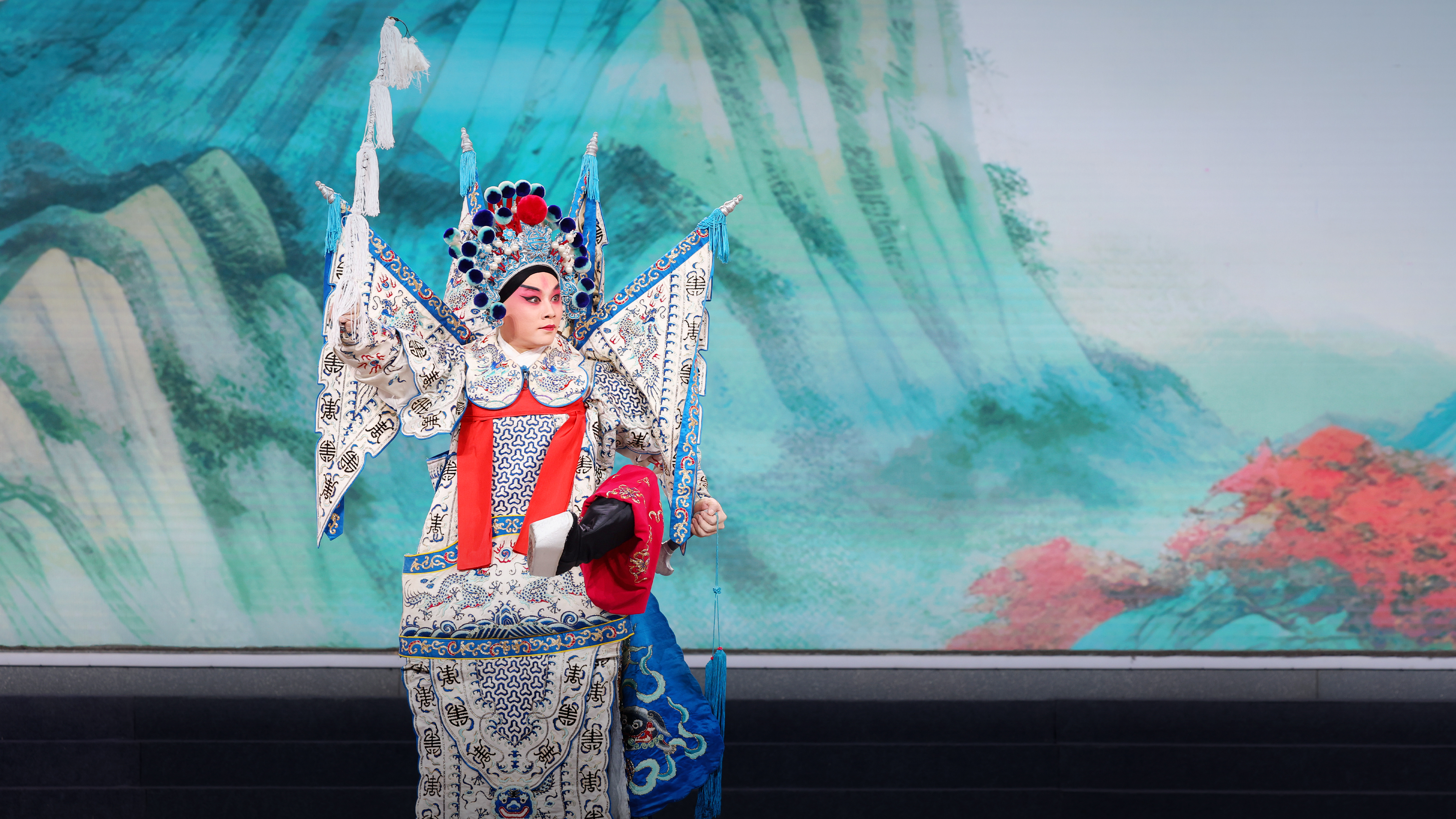 A young Peking Opera actor performs on stage in Beijing, China, in this undated photo. /Photo provided to CGTN